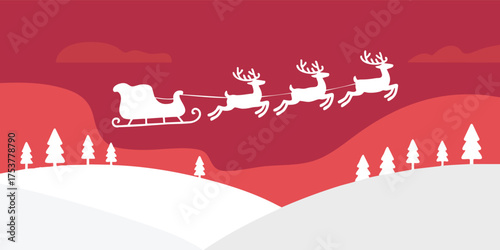 White silhouette of Santas sleigh pulled by three reindeer flies over snowy hills and trees against a layered red sky