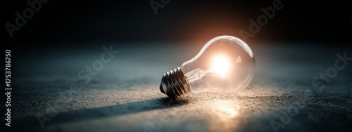 A close-up photo of a shining light bulb symbolizing truth , knowledge, clarity, enlightenment, honesty, integrity