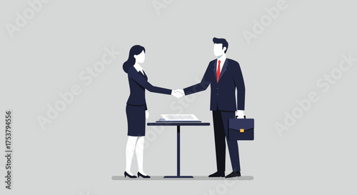 Business partners shaking hands after signing a contract, sealing the deal.