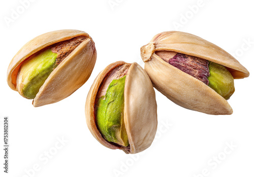 Three pistachios in their shells, close-up
