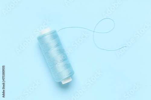 Light blue thread spool wit...