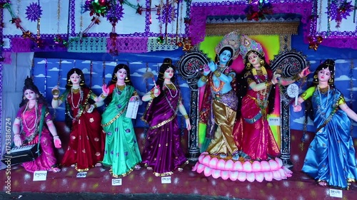 Idols of Radha Krishna and other deities are seen at the temporary puja pavilion on the occasion of Ras Mela Day at Dublar Char in the Sundarbans of Khulna district.