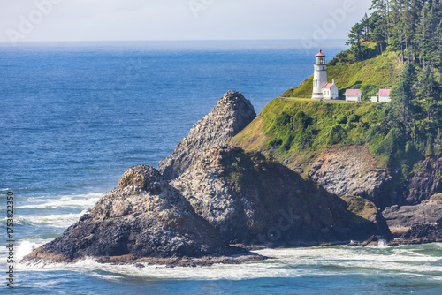 light house on cliff by sea