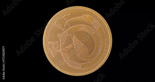 Reverse of Ireland coin half penny 1971 with image of fabulous bird, isolated in black background. Loopable animation in 4k resolution video
