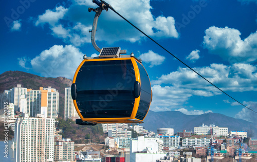 The cable car on blue sky with clouds in Busan, South Gyeongsang Province, South Korea.