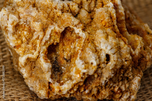 Mineralogical sample of quartz concretion partially colored by limonite, central Russia