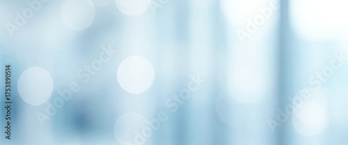 Abstract DSLR blurred office background with soft light blue tones and bokeh effects, creating a bright modern ambiance and professional visual softness.