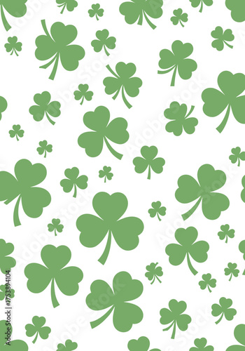 A repeating pattern of green shamrocks on a white background.