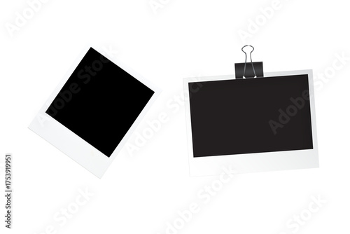 PNG image of Two blank polaroid frames one tilted and one with a clip on a black background for mock up use