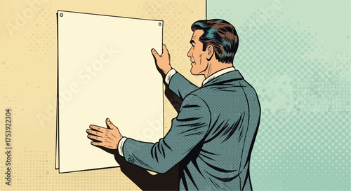 Man in Suit Attaching Blank Poster to Textured Wall