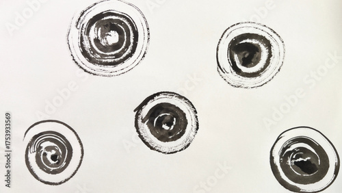 Ink-drawn water ripples, ripples painted with ink and brush, ink wash painting of ripples, round swirl