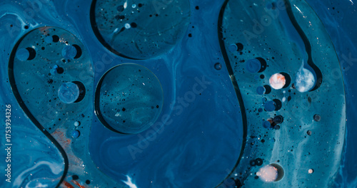 Water oil. Acrylic paint fluid. Defocused blue white purple color sparkling blend flow round bubbles floating on abstract background.