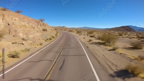 Desert Highway Under Clear Blue Sky With Mountains And Vegetation On Sunny Day, Arizona Usa