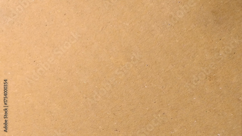 Abstract brown recycled paper background. Simple plain brown background, minimal brown wallpaper paper texture.

