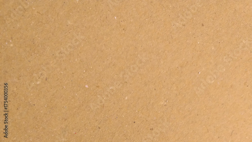Abstract brown recycled paper background. Brown background, kraft paper texture, design space.
