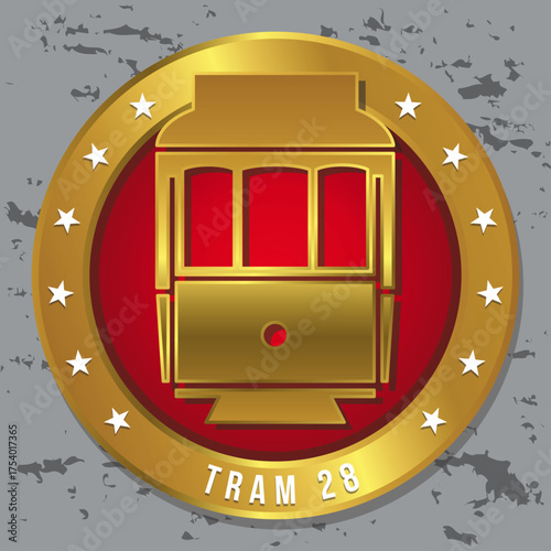 Luxury metallic gold icon of the Lisbon Tram 28 in a medal-style circular badge with a red center and white stars on a textured grey background.
