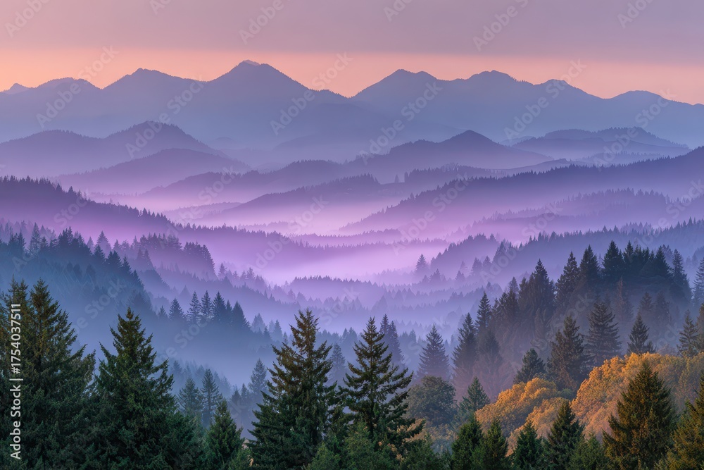 Fototapeta premium Layered mountain landscape at sunrise with atmospheric mist, purple hues, and evergreen forests.