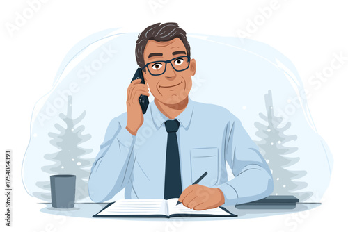 An adult man in glasses and a shirt talks on a phone while writing at a desk with winter trees in the background
