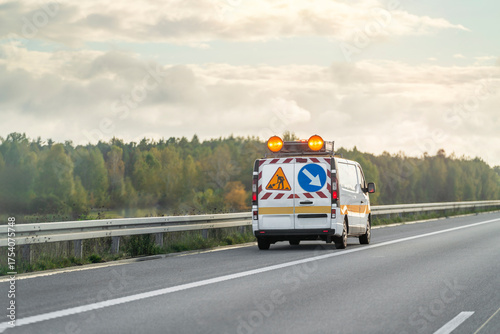 Wallpaper Mural Highway patrol van driving past billboard Torontodigital.ca