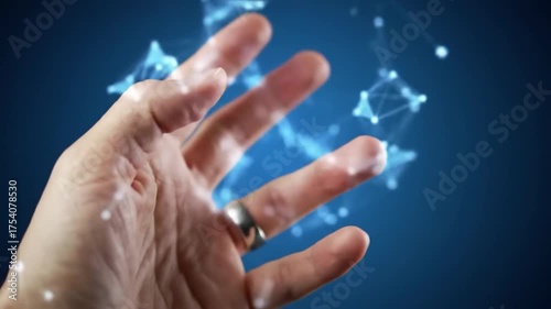 A human hand with a ring interacts with glowing digital network points on a deep blue background, futuristic tech