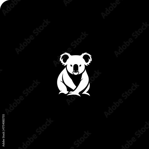 White silhouette of a seated koala against a stark black background