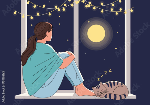 A young woman sits by the window gazing at the full moon with her cat sleeping peacefully beside her under string lights.