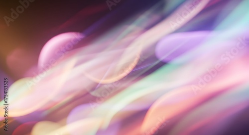 Abstract, blurred light streaks in warm and cool tones create a dynamic, ethereal glow