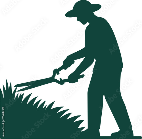 Gardener trimming grass with shears in a distinctive silhouette style
