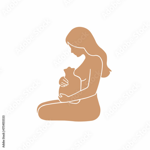 Pregnant woman sitting with hot water bottle