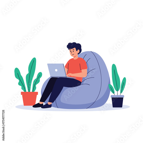 A person works comfortably on a laptop while sitting in a beanbag chair surrounded by plants.