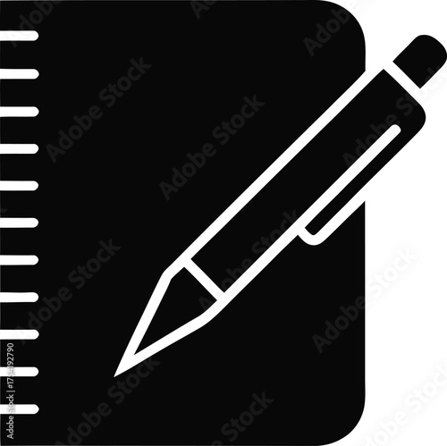 Silhouette of a hand writing in a notebook with a pen