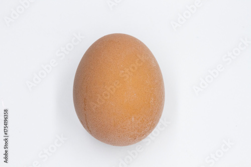 close-up of a boiled whole egg on a white background