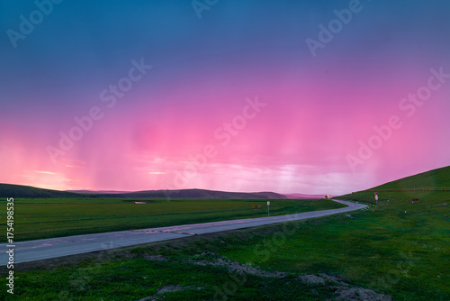 The sunset glow over the Morin Gol River Valley in the Hulun Buir Grassland, Inner Mongolia, China.