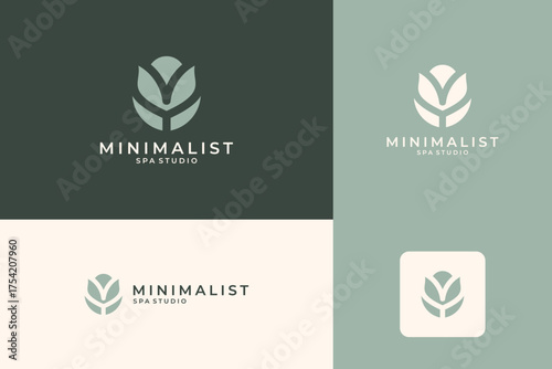 Minimalist lotus flower logo design. Beauty spa studio logo symbol.