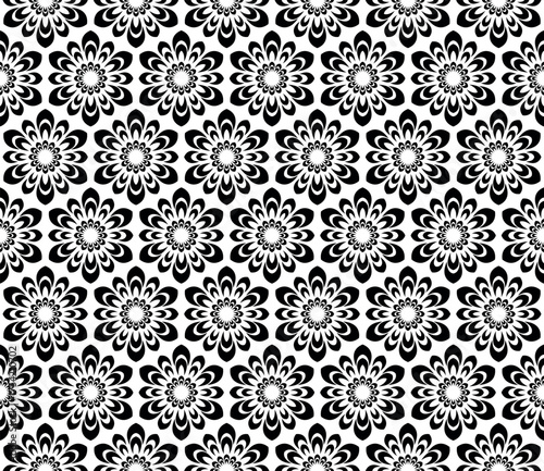 Flower geometric pattern. Seamless vector background. White and black ornament. Ornament for fabric, wallpaper, packaging. Decorative print.