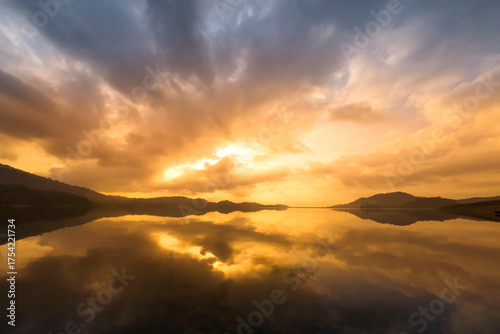 Beautiful sunrise of cloudscape in the mountains and lake at eastern of Thailand