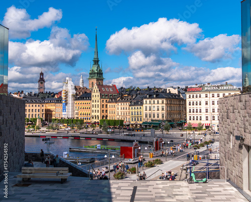Photography Stockholm's Gamla Stan with Church Spire and Colorful Buildings
