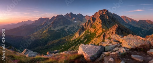 Majestic mountain range at sunrise with stunning landscape and vibrant colors