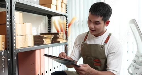 An online store owner preparing product packages for delivery, representing the growing e-commerce trend, small business management, and efficiency in online retail logistics.