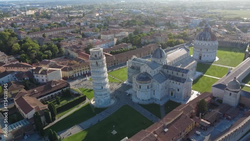 Pisa, Italy - September 05, 2025: the majestic architecture of Pisa’s historical Square of Miracles at sunset