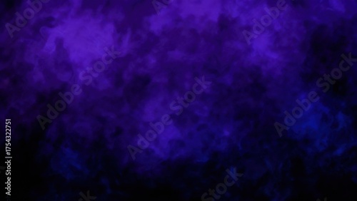 Intense vibrant purple and blue colored smoke fills a dark background space