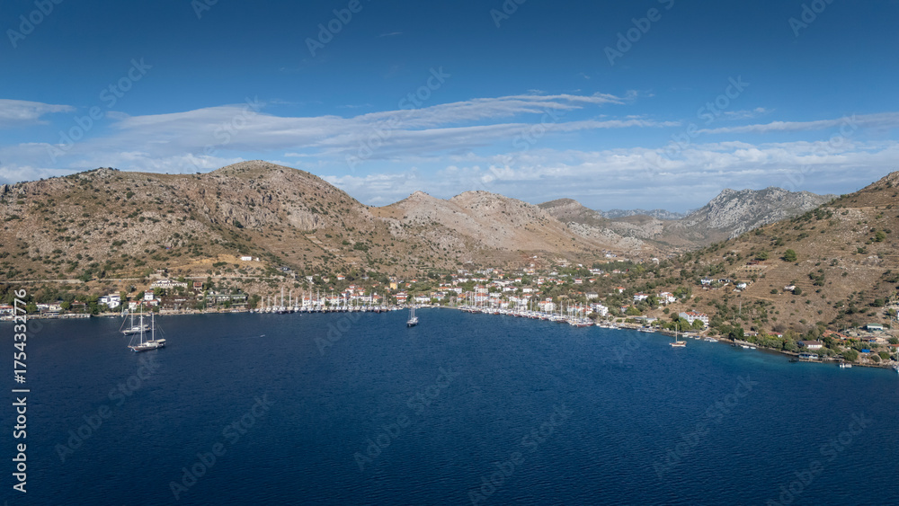 Obraz premium Aerial View of Bozburun Harbor and Sailboats in Marmaris, Turkey