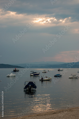 Lonely yaht at the shore of beautiful Greece island.