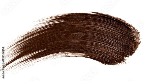 Brown makeup brushstroke creating artistic texture on white