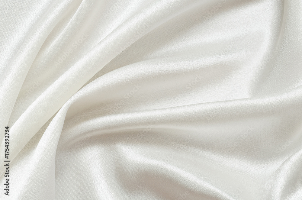 Obraz premium Texture od folded white satin fabric