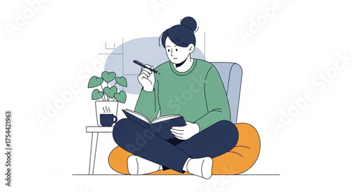 A young woman is sitting on a beanbag chair, reading a book, and writing in a notebook with a pen, she is wearing a green sweater