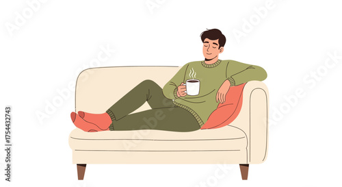 Man relaxing on a sofa with a cup of hot drink.