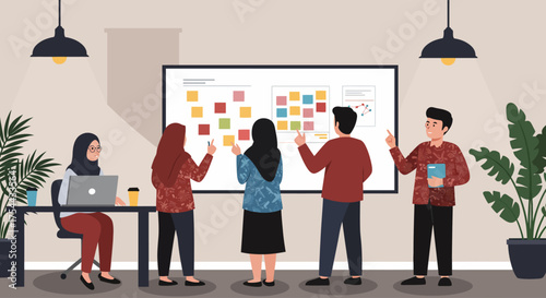 Asian team discuss in an office with a whiteboard and post it notes.
