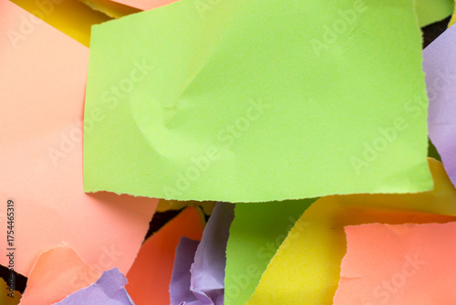 torn and colorful pieces of paper
