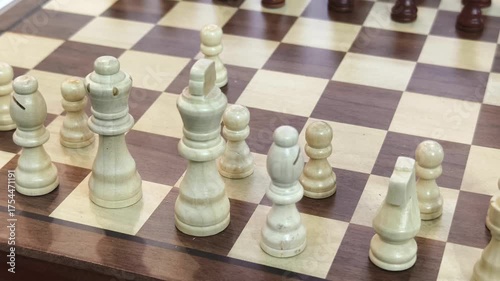 Robot versus human in a strategic chess match showcasing artificial intelligence skills